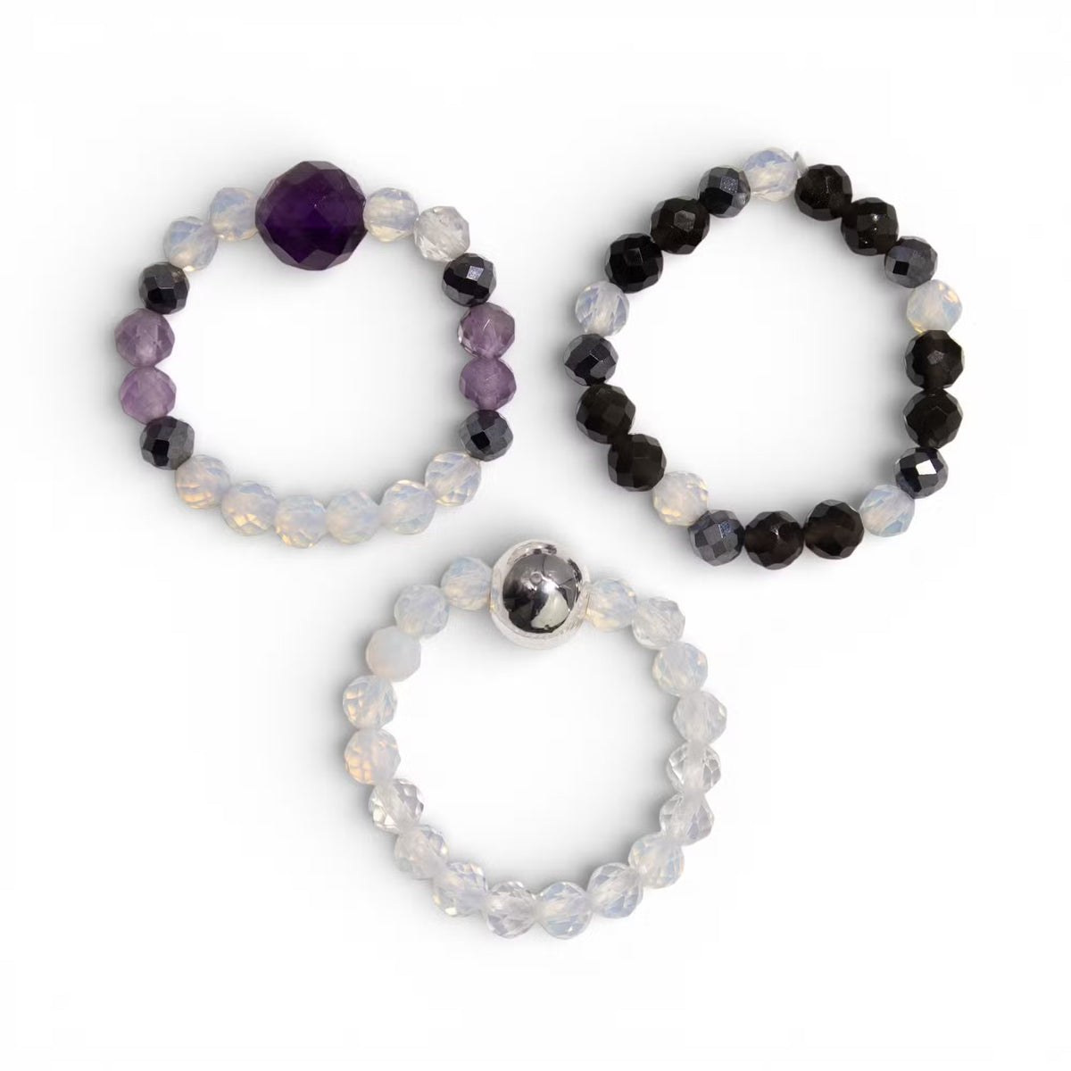 Trinité de la Lune Noire — Trio de Bagues en Pier