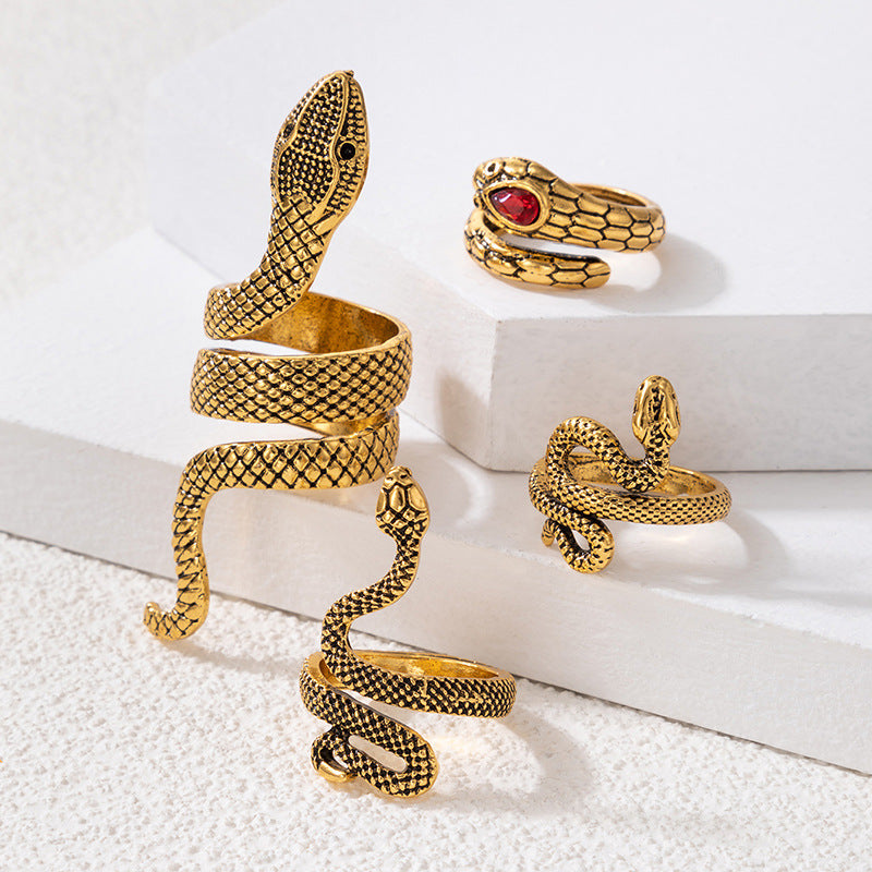 Set de 4 Bagues Serpent Or Vieilli & Rubis Pourpre – Serpents Sacrés