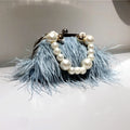 Sac de Soirée Plumes & Perles – Éclat d’Hiver