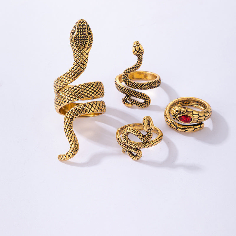 Set de 4 Bagues Serpent Or Vieilli & Rubis Pourpre – Serpents Sacrés