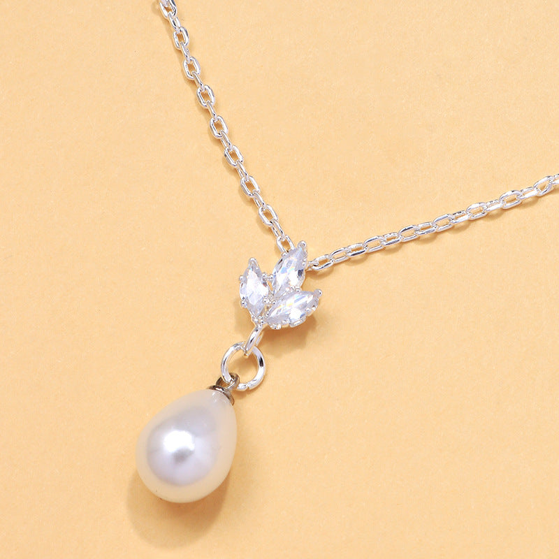 Collier Perles de Minuit – Éclat Zircon