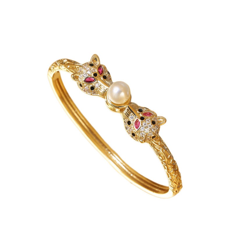 Bracelet Félins d’Or & Perle – Éclat Rétro