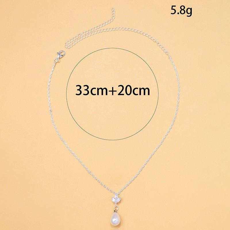 Collier Perles de Minuit – Éclat Zircon