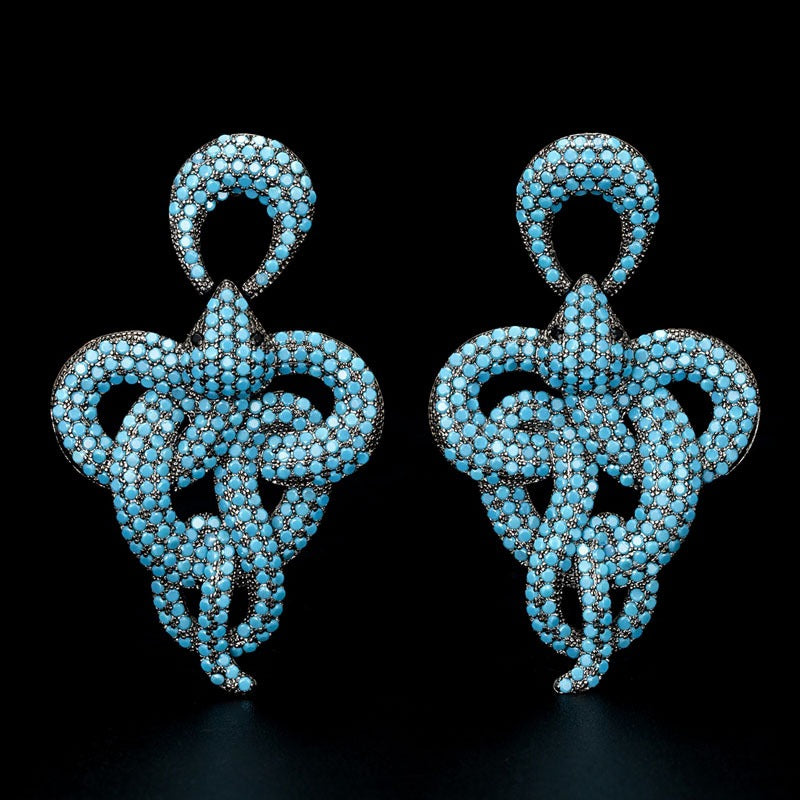 Les Serpents de l’Illusionniste — Boucles d’Oreilles Scintillantes