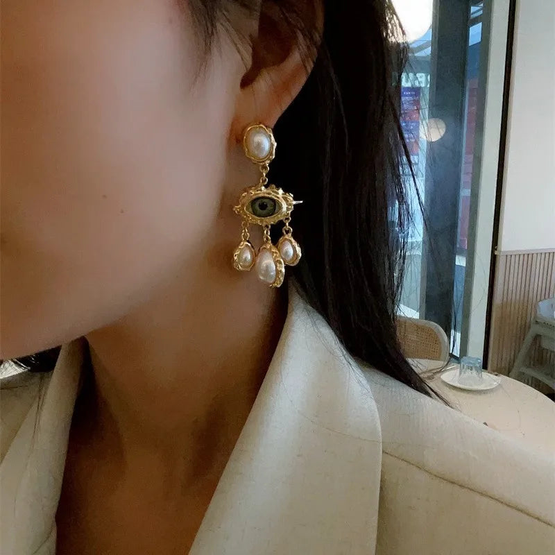 Le Regard des Ombres — Boucles d’Oreilles Œil & Perles