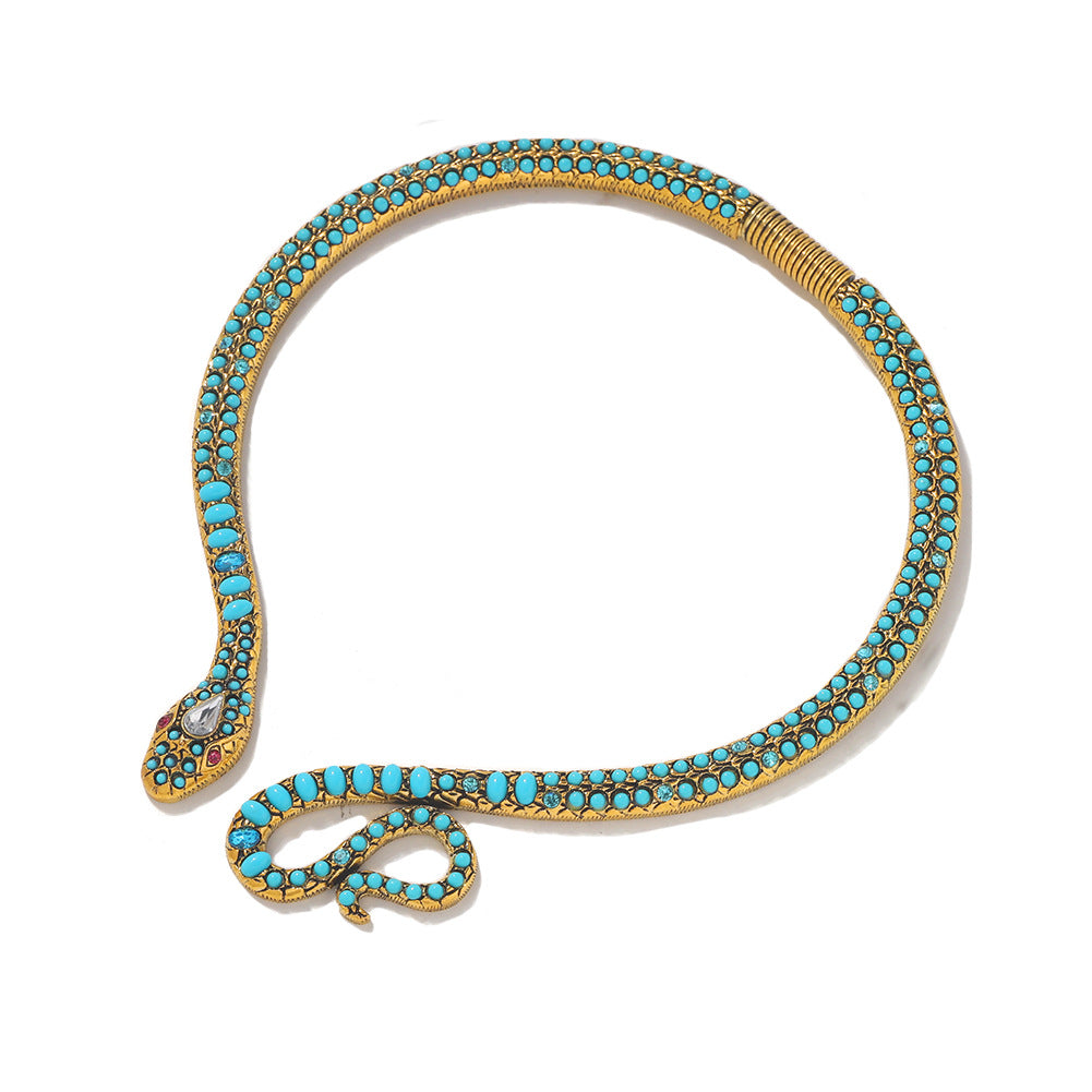 Le Serpent de l’Illusion — Collier Serpent Turquoise & Or