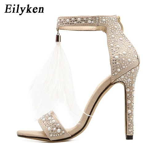 Ceremonial white feathered voodoo sandals