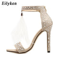 Ceremonial white feathered voodoo sandals