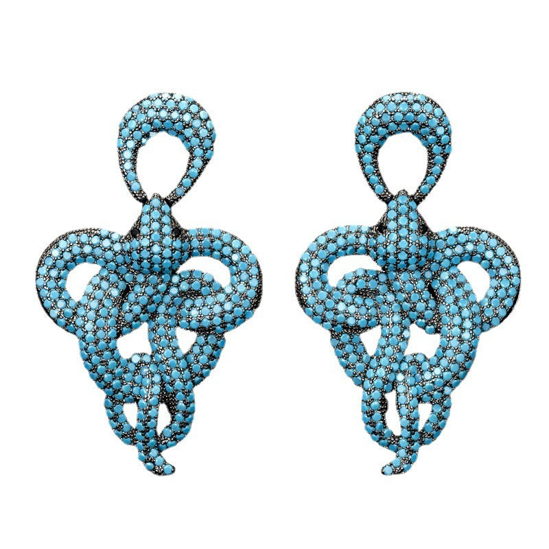 Les Serpents de l’Illusionniste — Boucles d’Oreilles Scintillantes