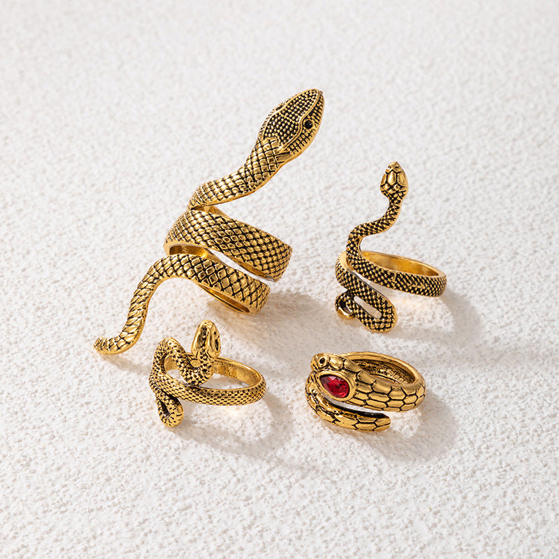 Set de 4 Bagues Serpent Or Vieilli & Rubis Pourpre – Serpents Sacrés