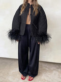Veste Nocturne à Plumes – Élégance Gothique Noire