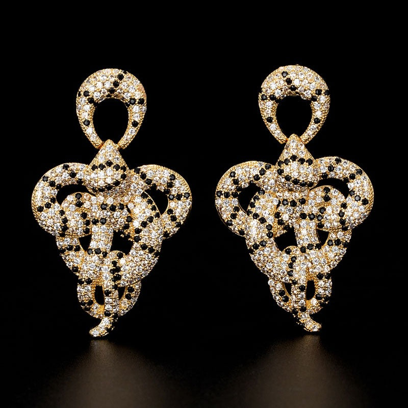 Les Serpents de l’Illusionniste — Boucles d’Oreilles Scintillantes
