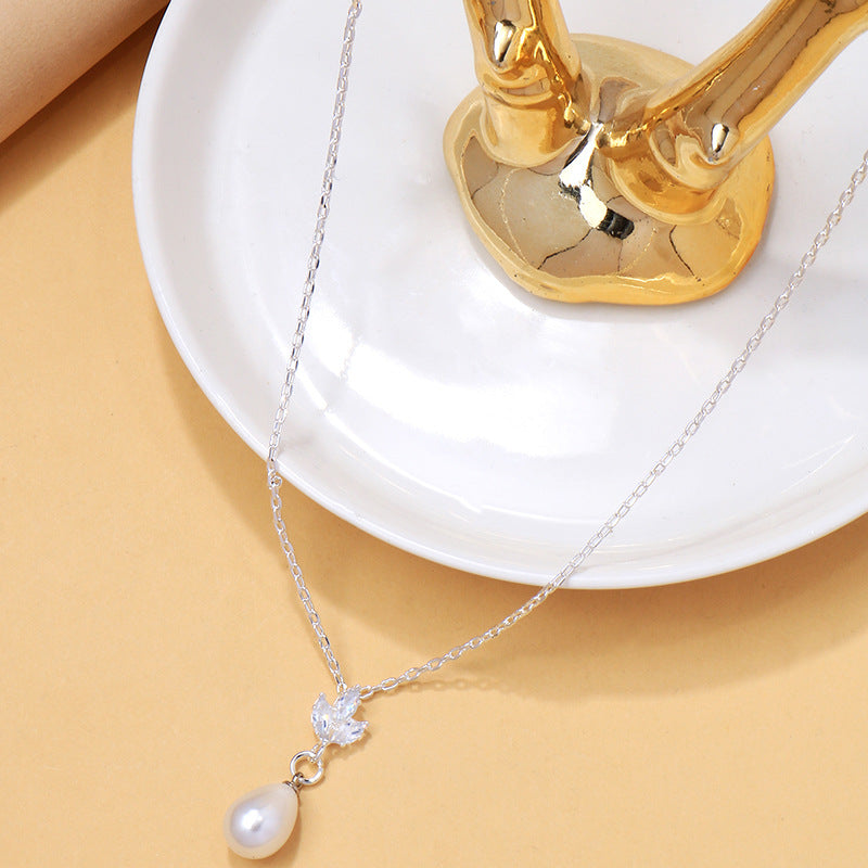 Collier Perles de Minuit – Éclat Zircon