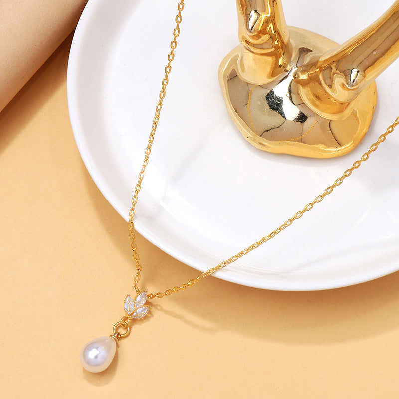 Collier Perles de Minuit – Éclat Zircon