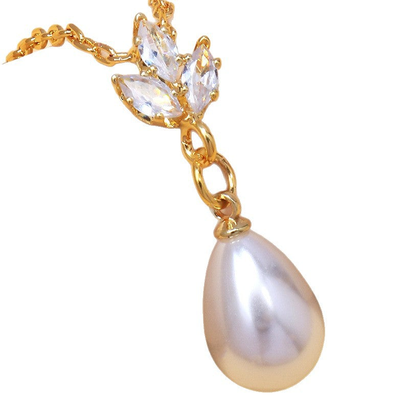 Collier Perles de Minuit – Éclat Zircon