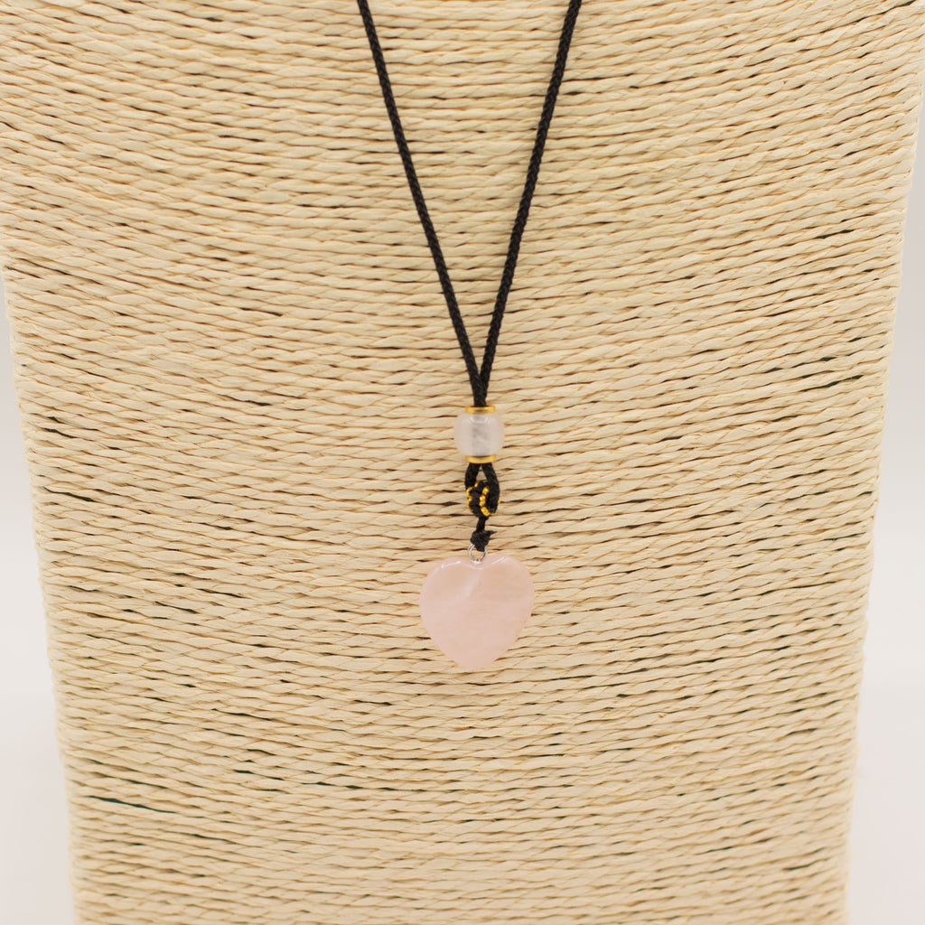 Cœur des Abysses – Pendentif Cœur en Quartz Rose